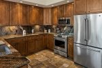 There`s plenty granite counter space for prepping meals